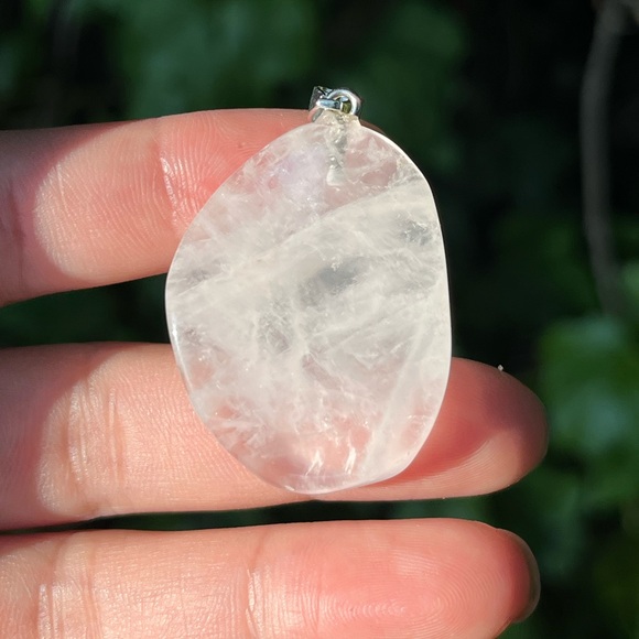 Jewelry - Stainless steel wavy clear Quartz pendant
